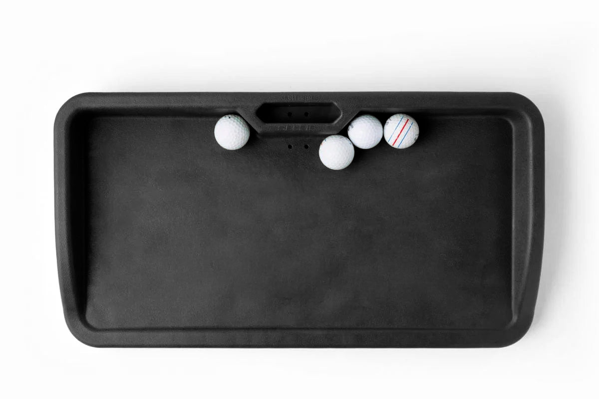 Black golf tray holder with golf balls on a white background